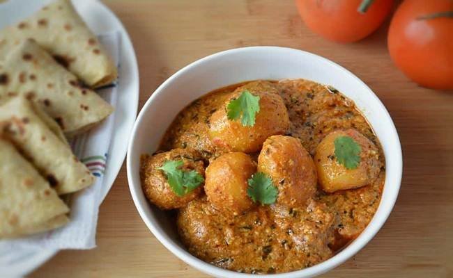 Kashmiri Dishes Dum Aloo with spicy yogurt gravy