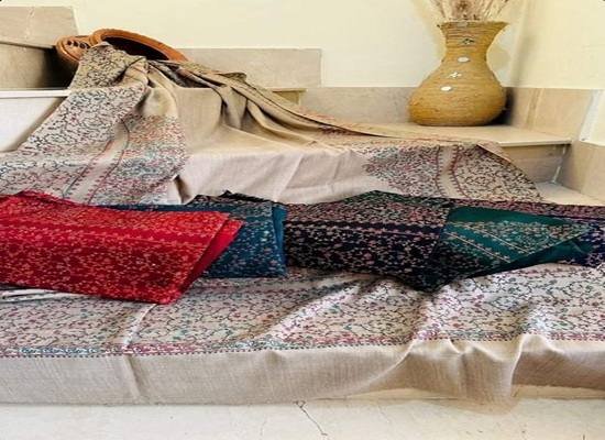 Handwoven Kashmiri Pashmina shawl on display