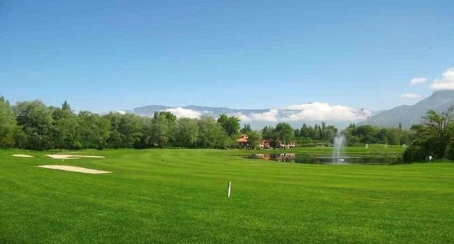 Pahalgam Golf Course with Lidder River and pine forest