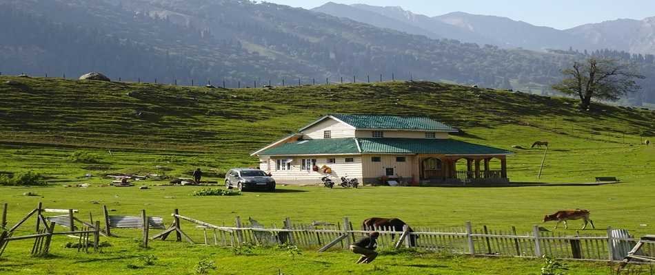 Scenic valley view of Pahalgam Kashmir with Lidder River and green meadows